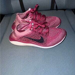 Nike flynet. Size 5. pink and black. Warm Less then a handle full of times.